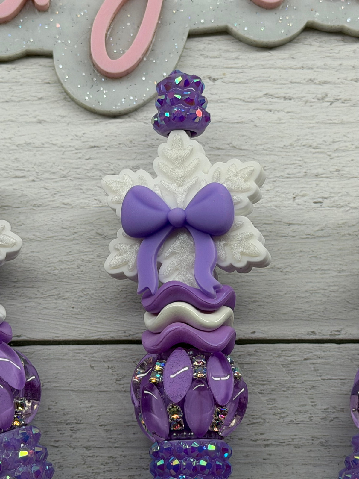 Lavender bow snowflake on a lavender rhinestone pen