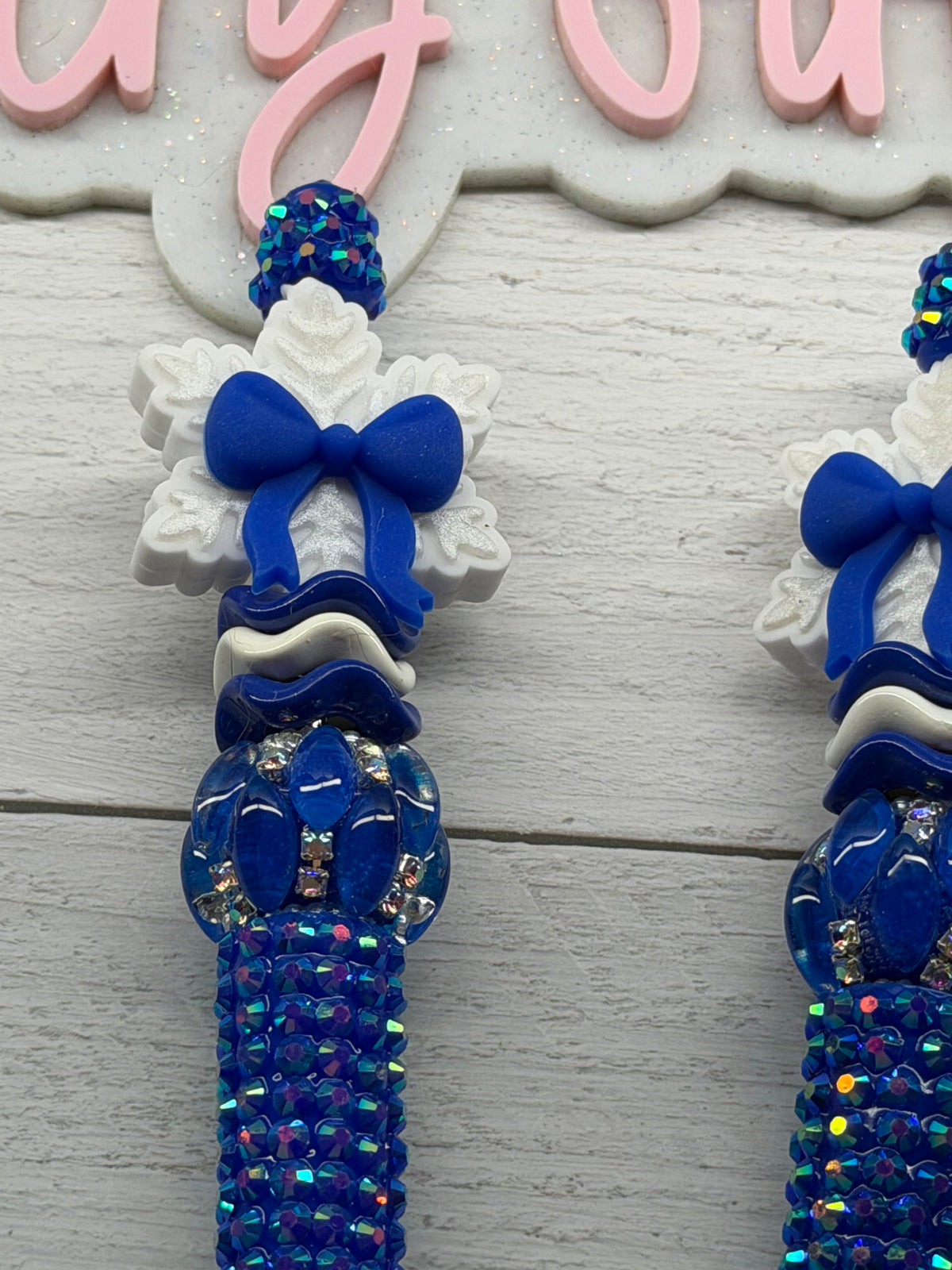 Royal blue bow snowflake on blue rhinestone pen