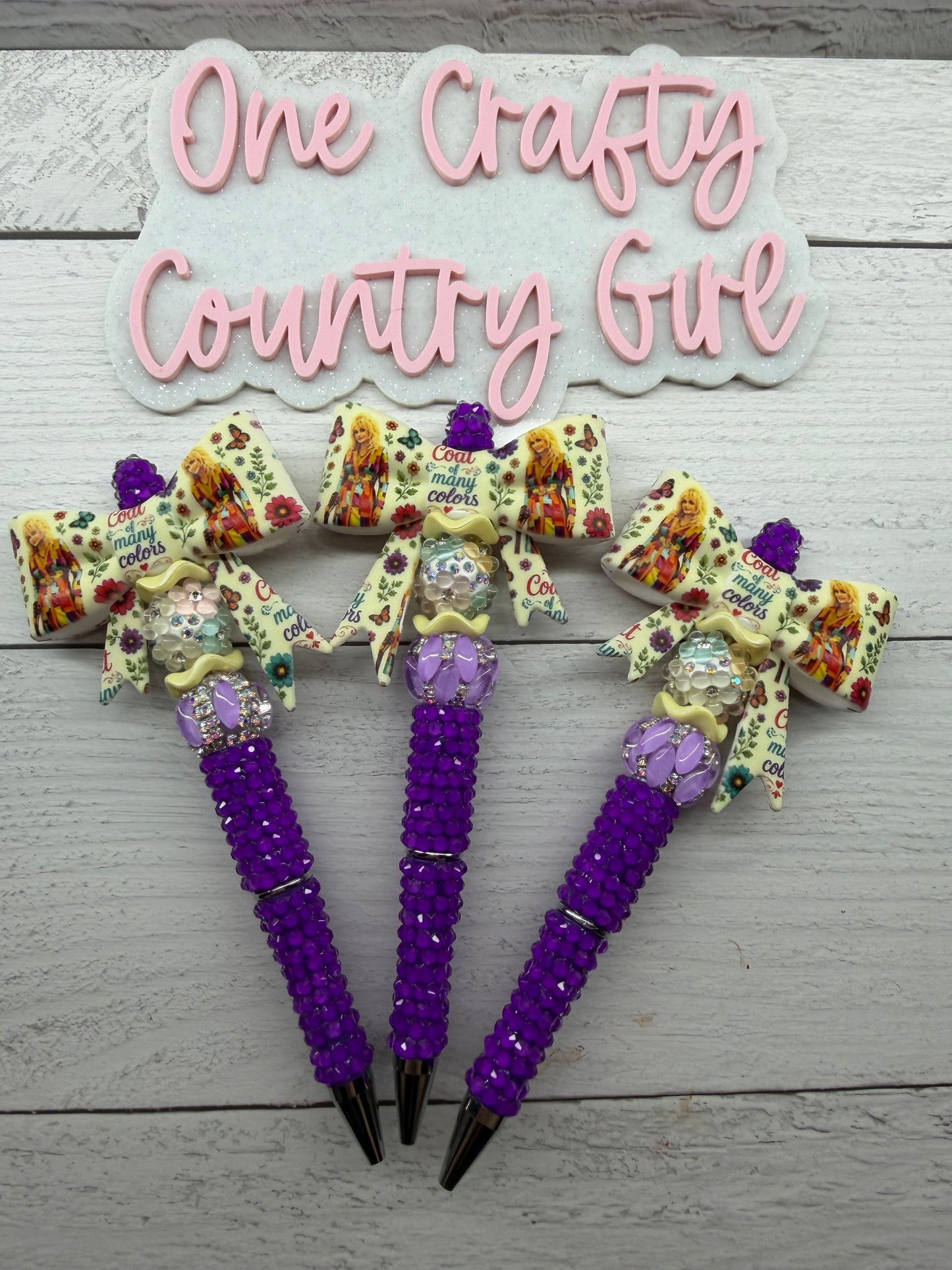 Coat of many Colors Yellow Bow on a neon purple pen (Dolly Collection2)