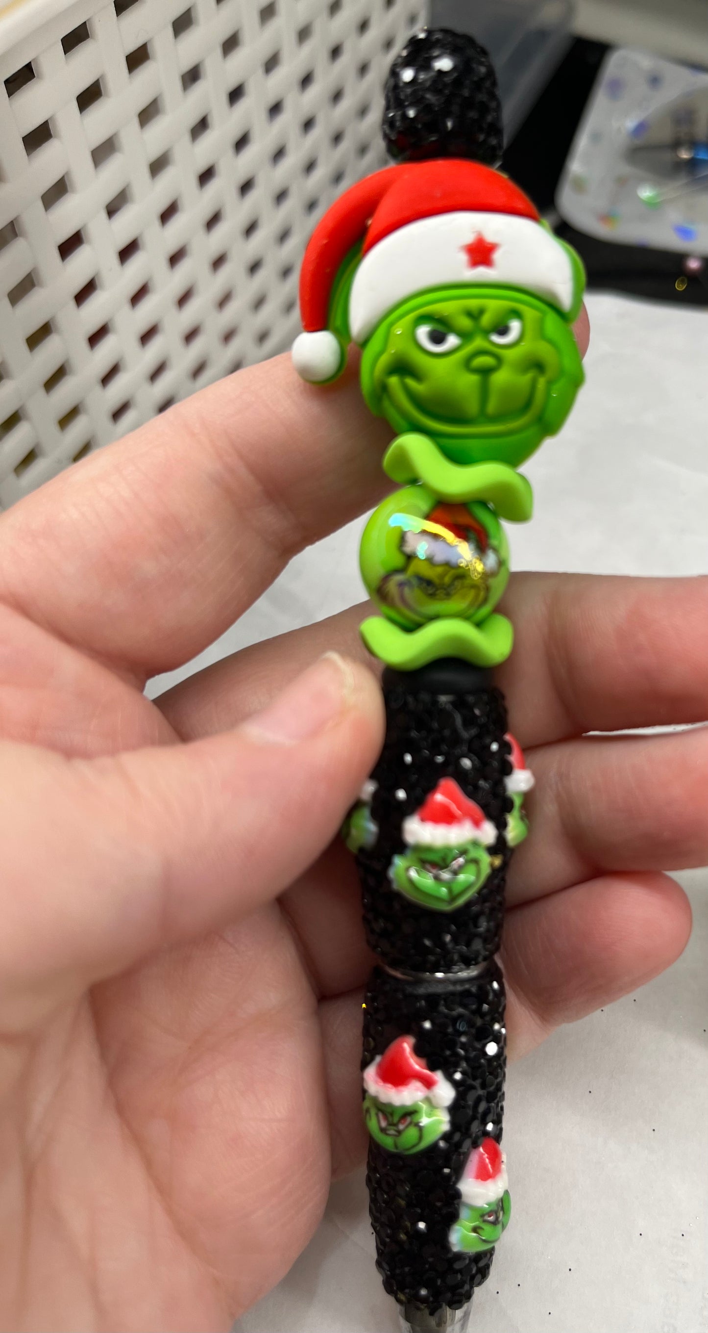 Santa hat on green man on black bling green man pen