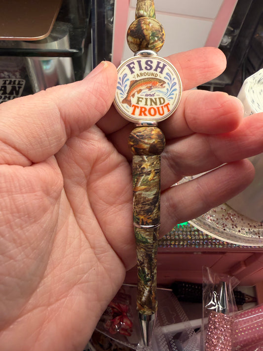 Fish around and find trout on camo printed pen.