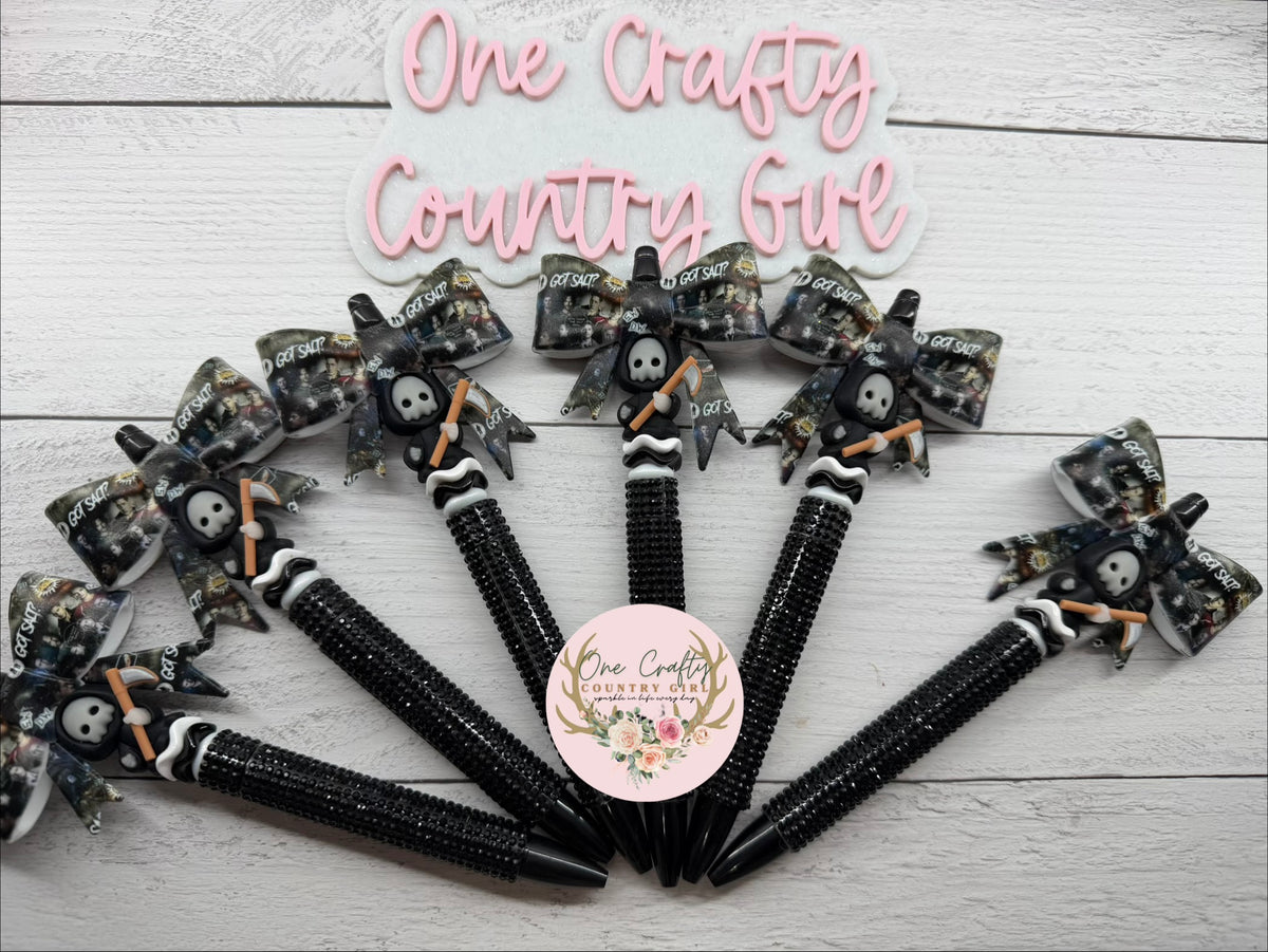 Supernatural inspired bow with a glow in the dark reaper on black plastic rhinestone pen