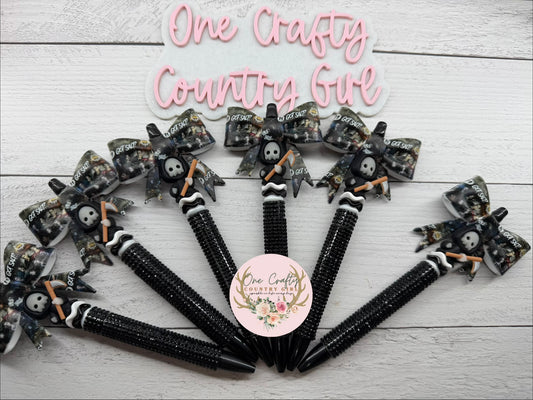 Supernatural inspired bow with a glow in the dark reaper on black plastic rhinestone pen