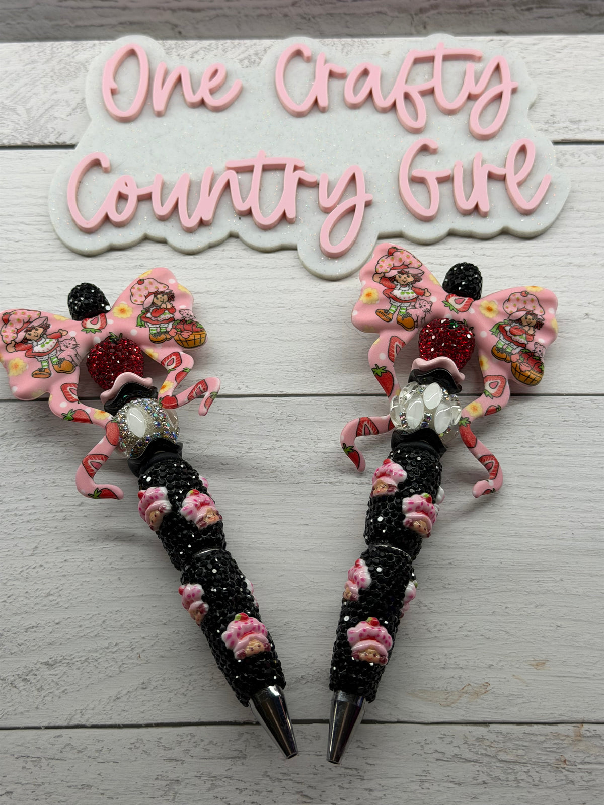 Strawberry Shortcake inspired bow on a strawberry shortcake rhinestone pen