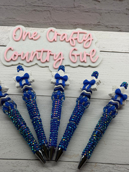 Royal blue bow snowflake on blue rhinestone pen