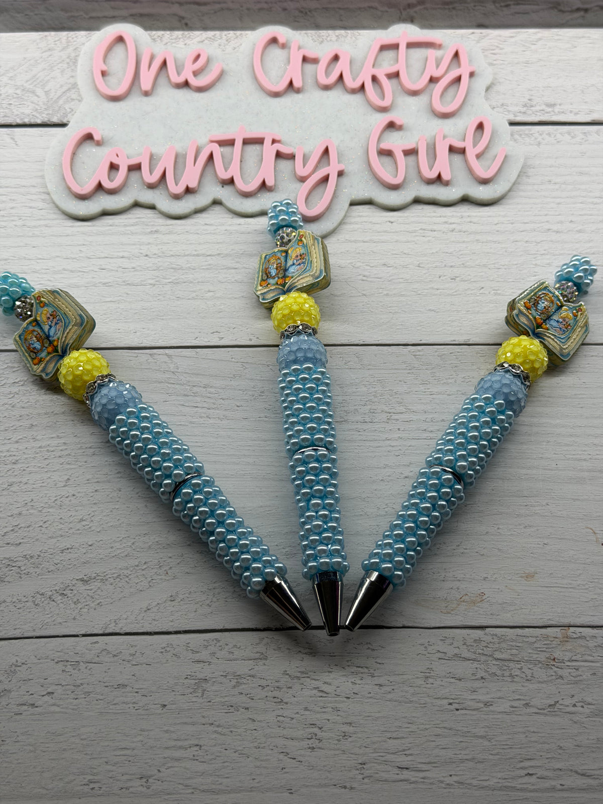 Princess with mouse book collection on a light blue pearl pen