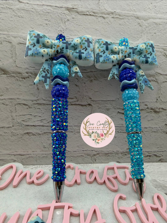 Blue cross and flowers bow on rhinestone pen
