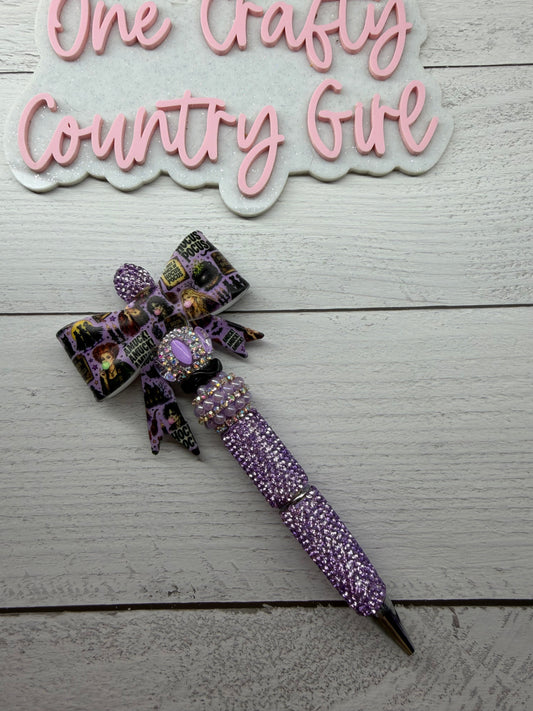 A muck a muck a muck purple hocus pocus inspired purple bow on a light purple rhinestone pen