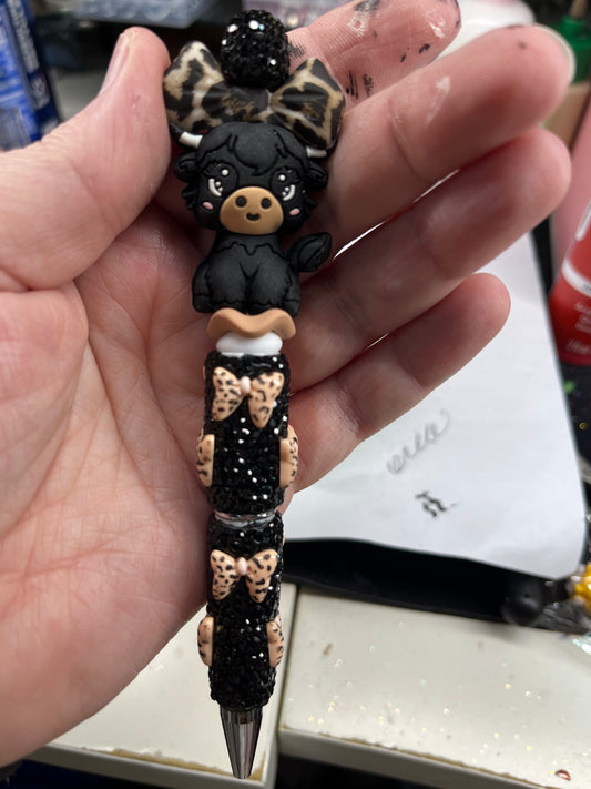 Leopard Bow Black Cow on a Fancy Bling Leopard Bow Pen